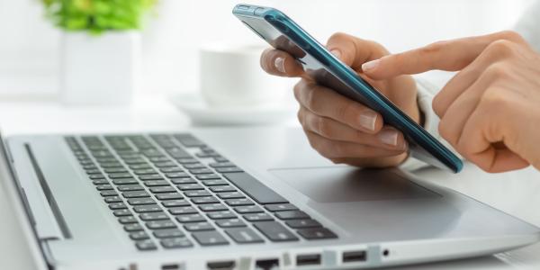 Photo of laptop and phone
